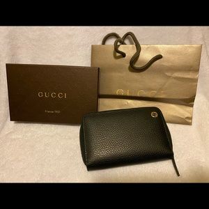 Gucci compact zip around wallet